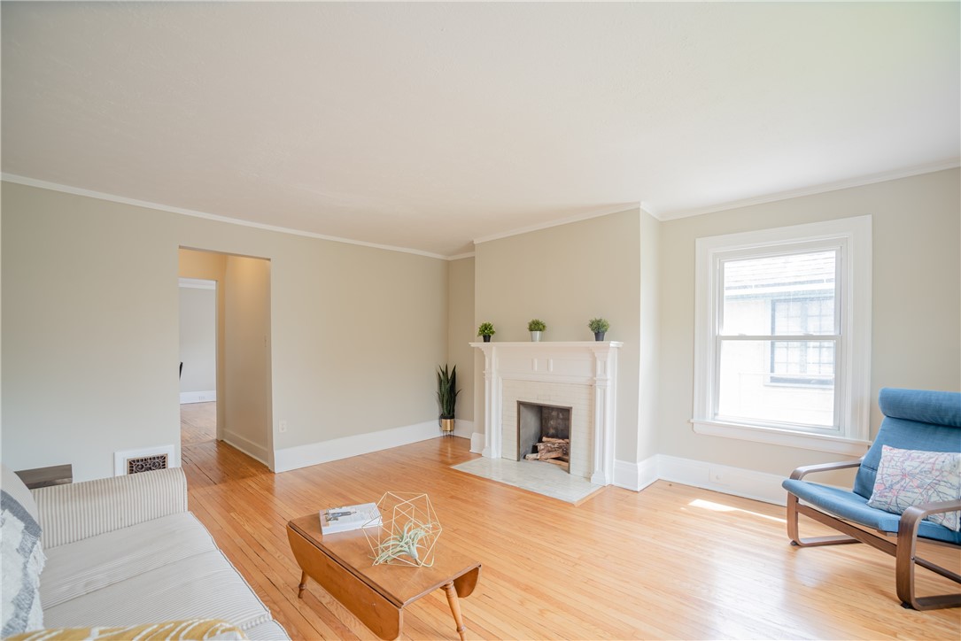 212 Culver Road, Unit 2 Rochester, NY 14607 - Photo 2 of 22 Living Room / Faux Fireplace