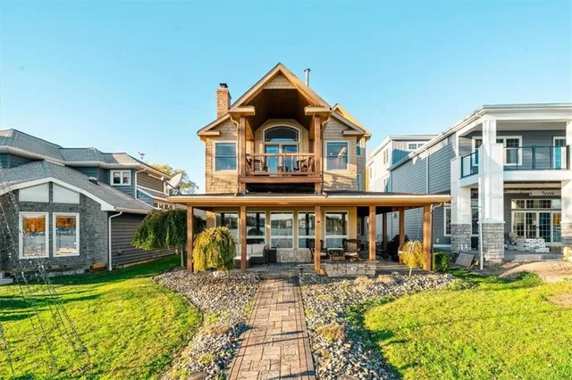 a front view of a house with swimming pool