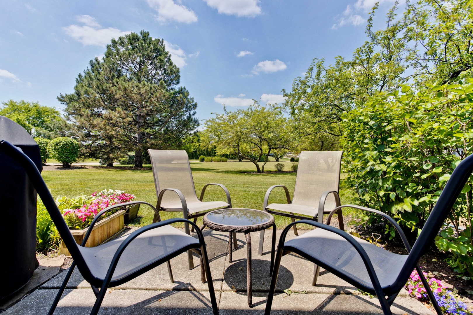 17898 Braewick Road Gurnee, IL 60031 - Photo 2 of 25 a view of a chairs and table in a yard