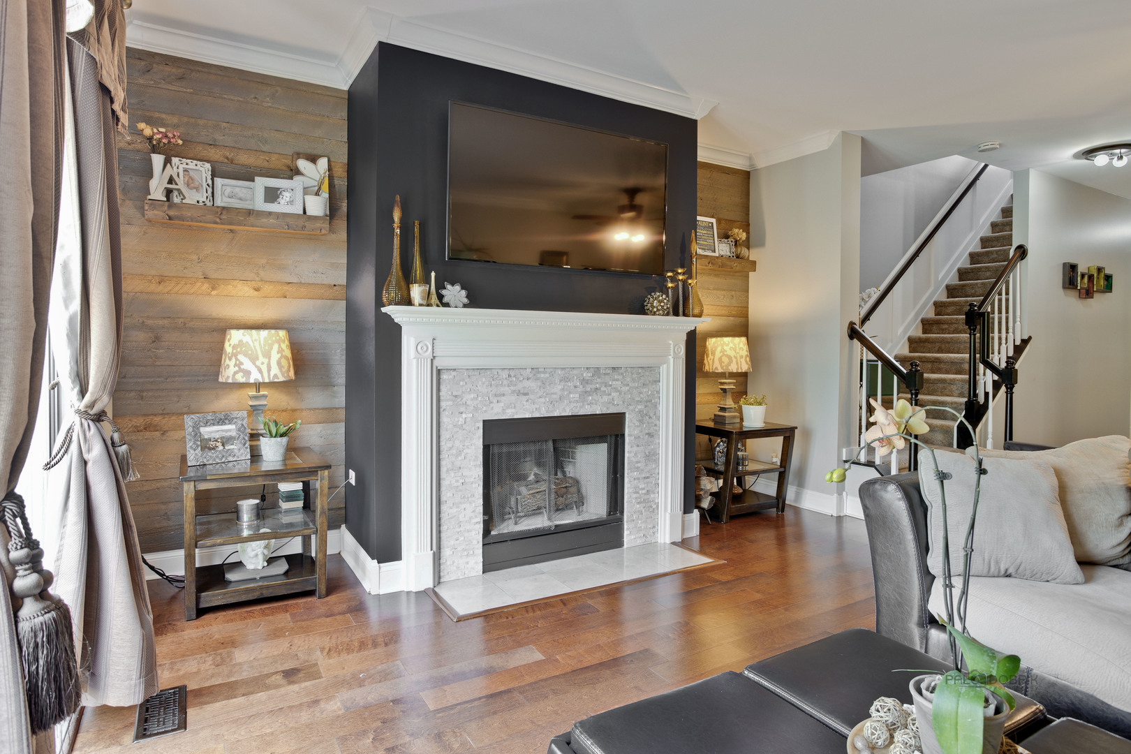 17898 Braewick Road Gurnee, IL 60031 - Photo 13 of 25 a living room with furniture and a fireplace