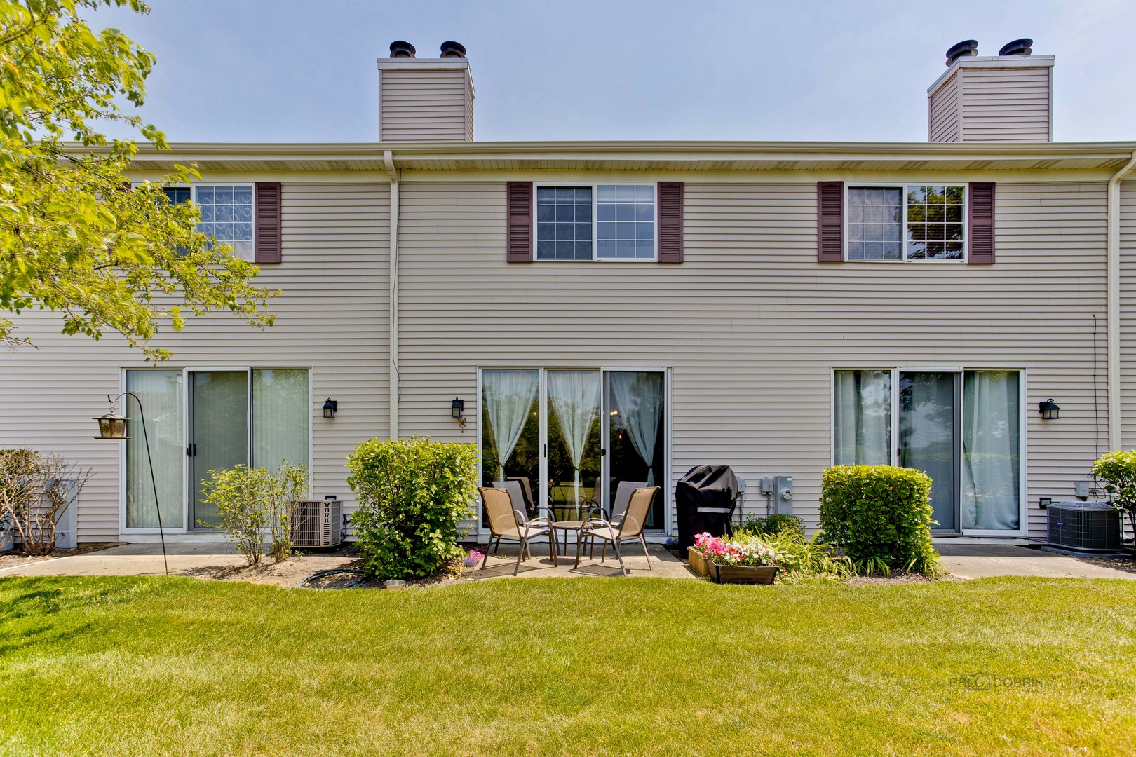 17898 Braewick Road Gurnee, IL 60031 - Photo 22 of 25 a view of a house with a yard and plants