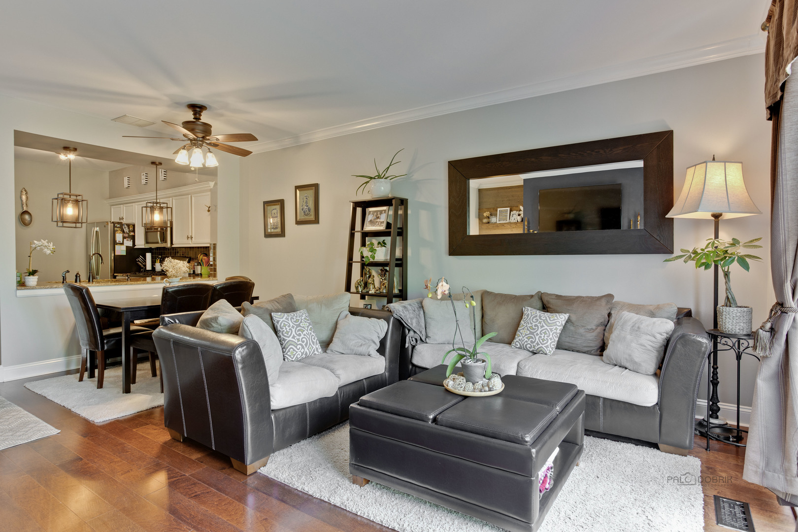 17898 Braewick Road Gurnee, IL 60031 - Photo 10 of 25 a living room with furniture and a flat screen tv