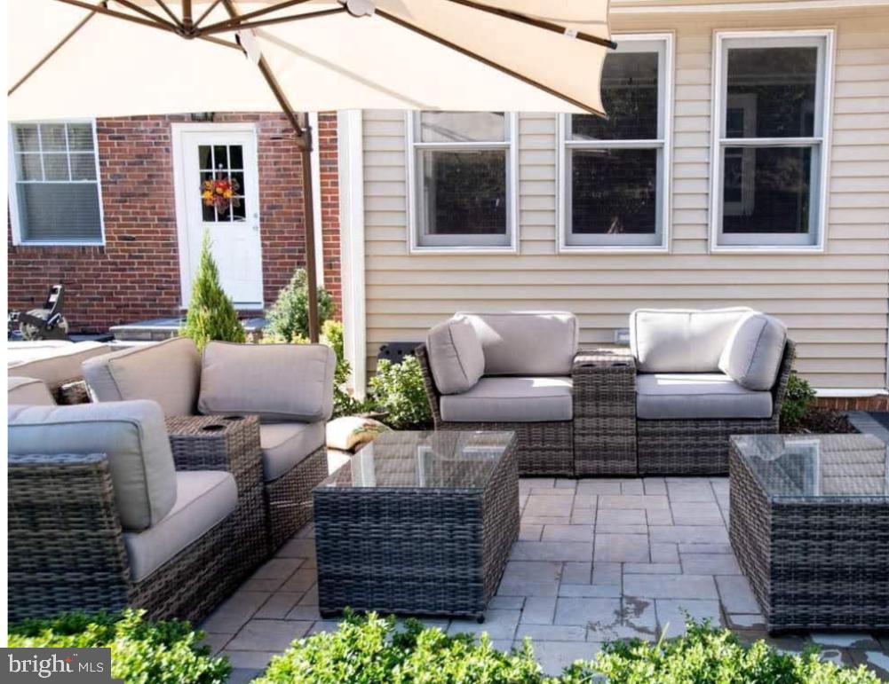 205 North Haddon Avenue Haddonfield, NJ 08033 - Photo 15 of 16 a view of a patio with couches and potted plants
