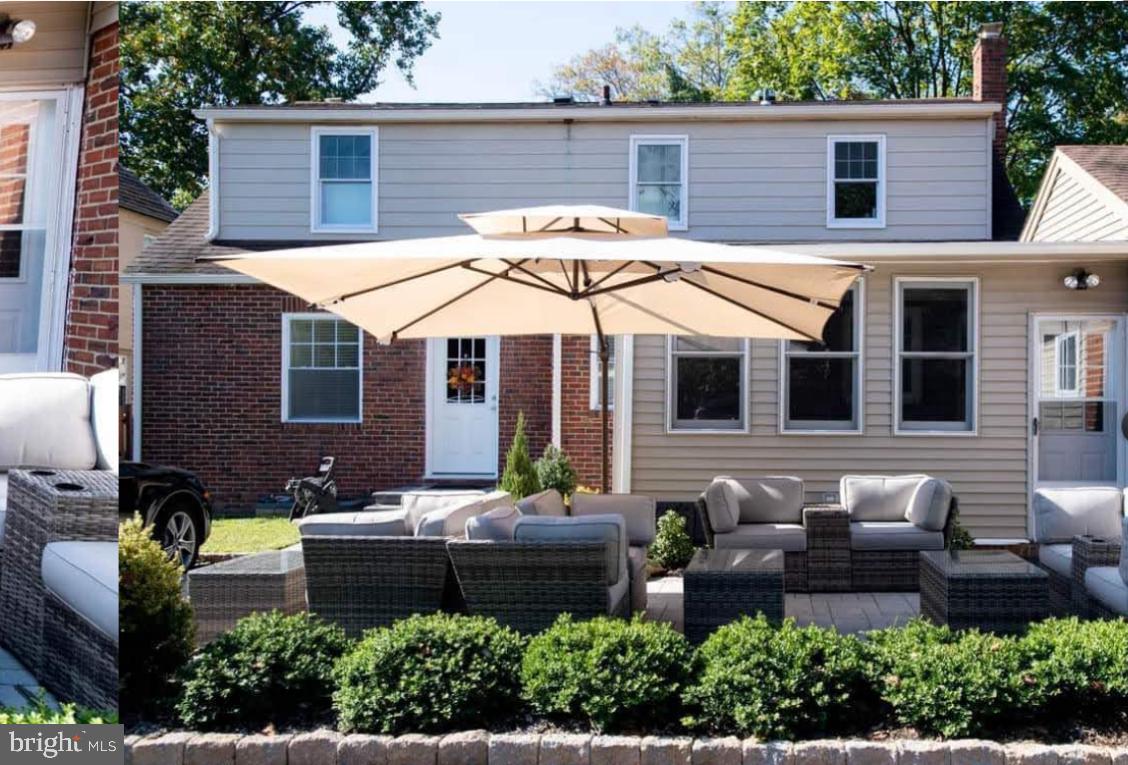205 North Haddon Avenue Haddonfield, NJ 08033 - Photo 16 of 16 a front view of a house with porch and garden