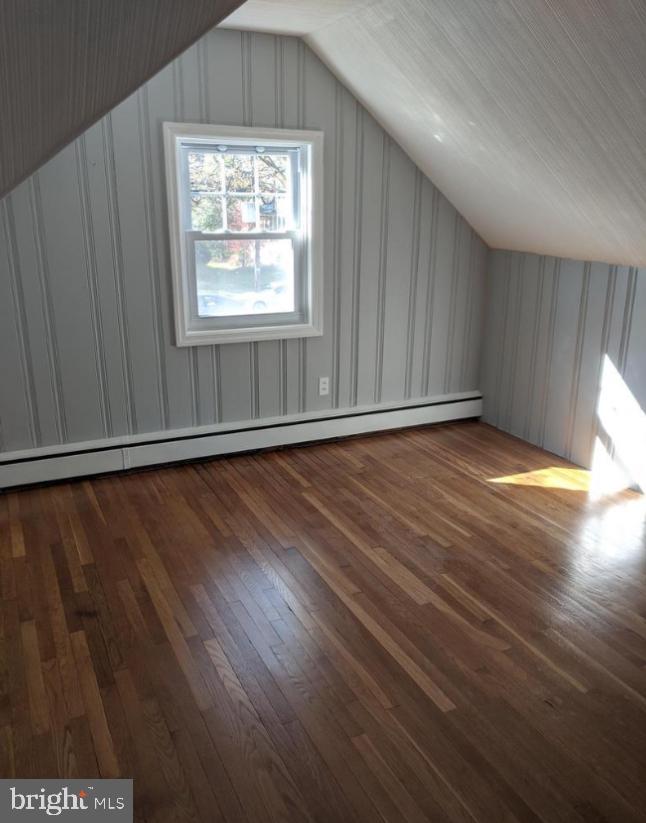 205 North Haddon Avenue Haddonfield, NJ 08033 - Photo 9 of 16 an empty room with wooden floor and windows