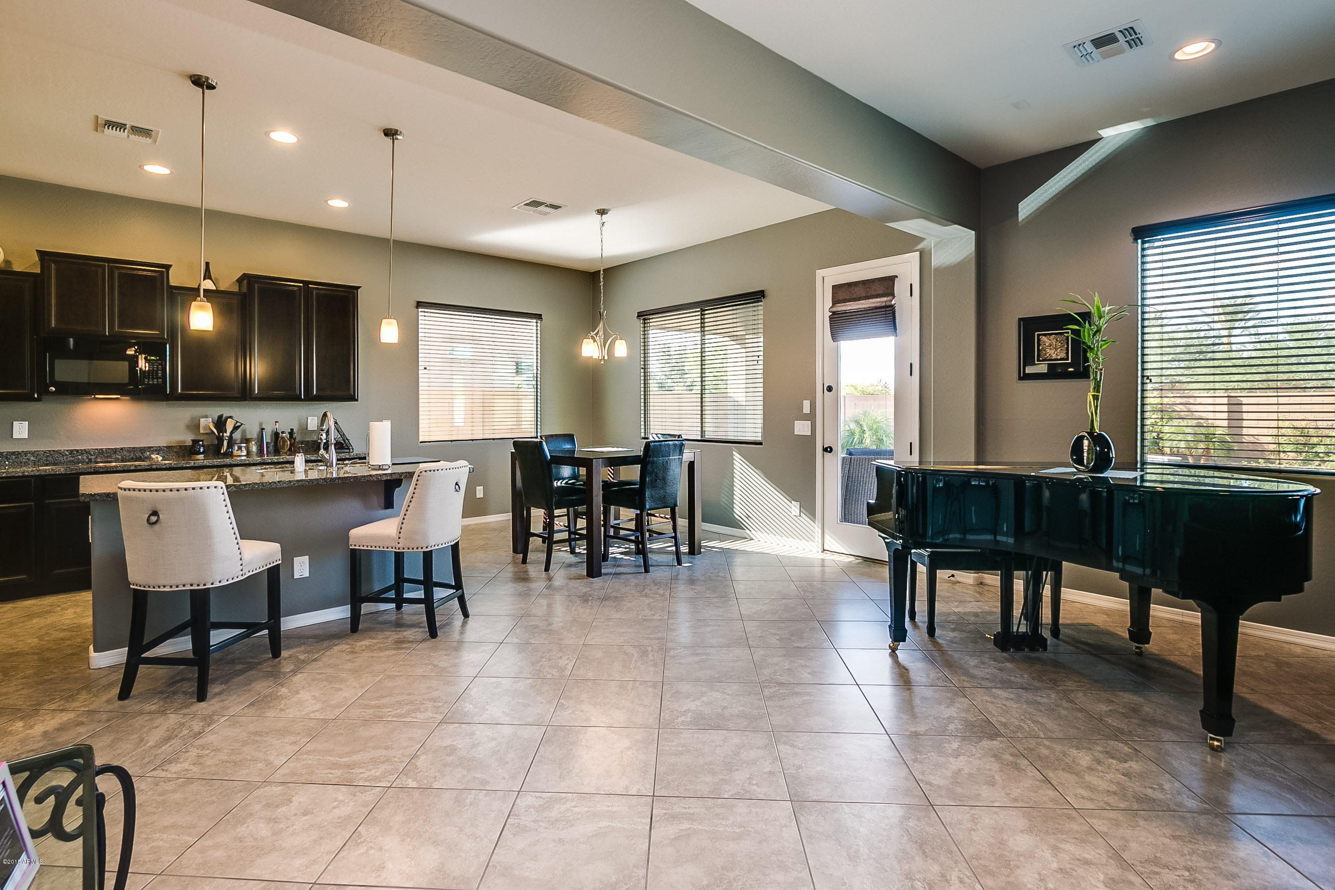 16014 West Berkeley Road Goodyear, AZ 85395 - Photo 31 of 32 Open Concept Great Room Floor Plan