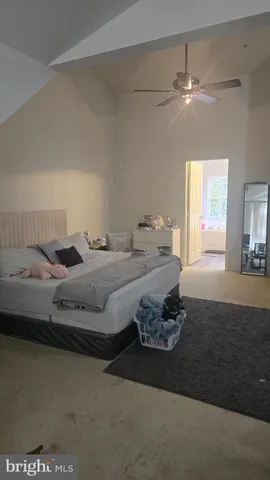 a bathroom with a tub sink and window