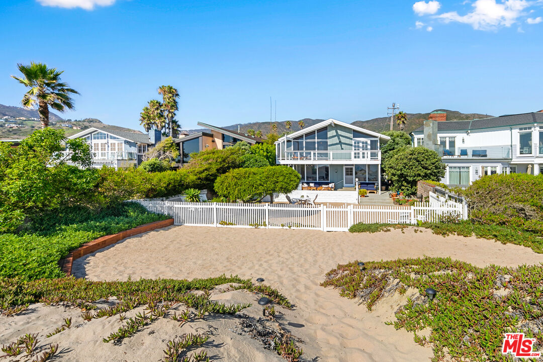 30800 Broad Beach Road Malibu, CA 90265 - Photo 15 of 28 a front view of a house with a yard