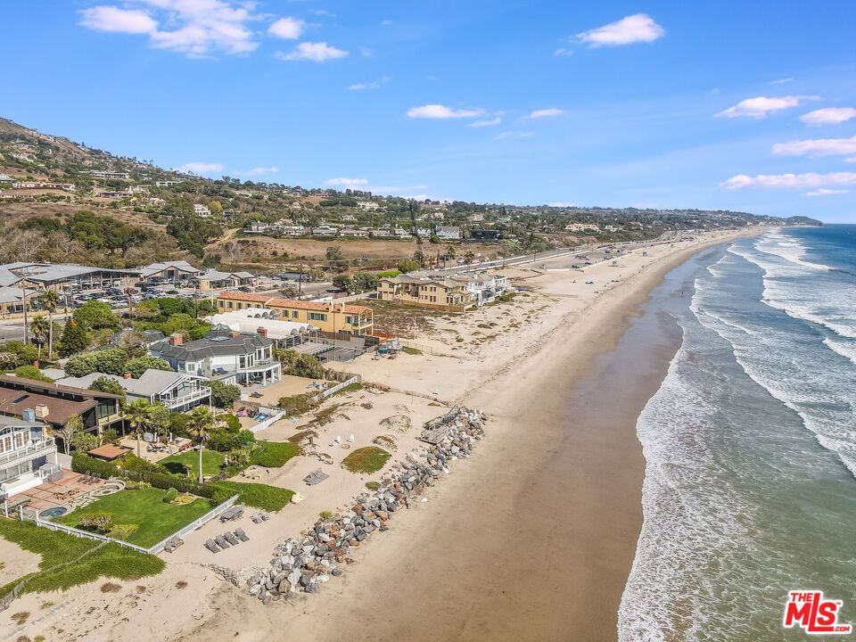 30800 Broad Beach Road Malibu, CA 90265 - Photo 16 of 28 a view of an ocean beach and mountain