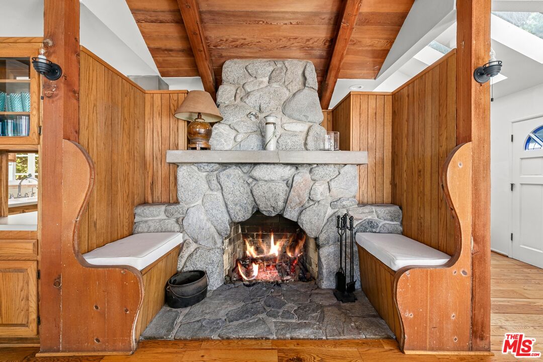 30800 Broad Beach Road Malibu, CA 90265 - Photo 18 of 28 a living room with furniture and a fireplace