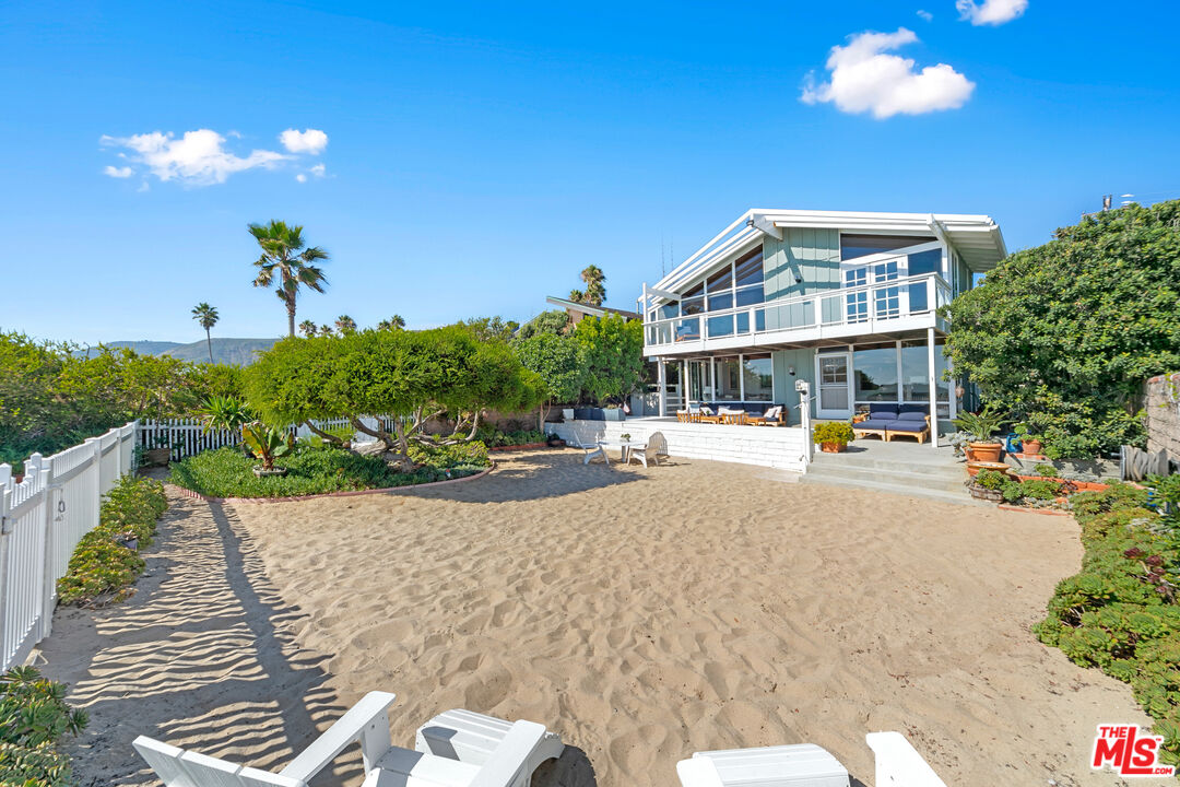 30800 Broad Beach Road Malibu, CA 90265 - Photo 3 of 28 a view of a house with swimming pool