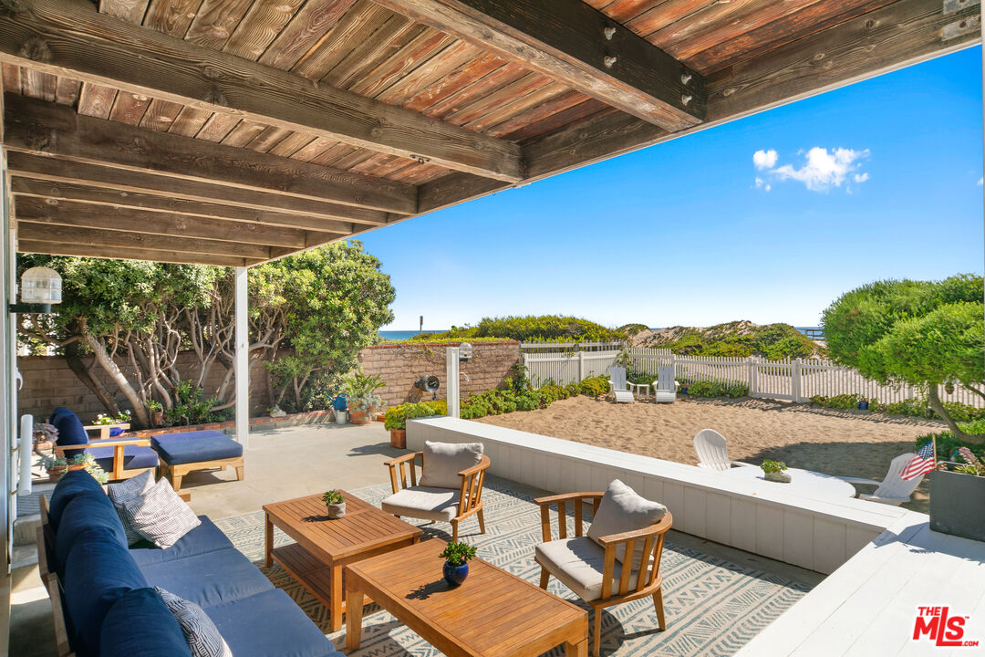 30800 Broad Beach Road Malibu, CA 90265 - Photo 4 of 28 a view of a patio with swimming pool