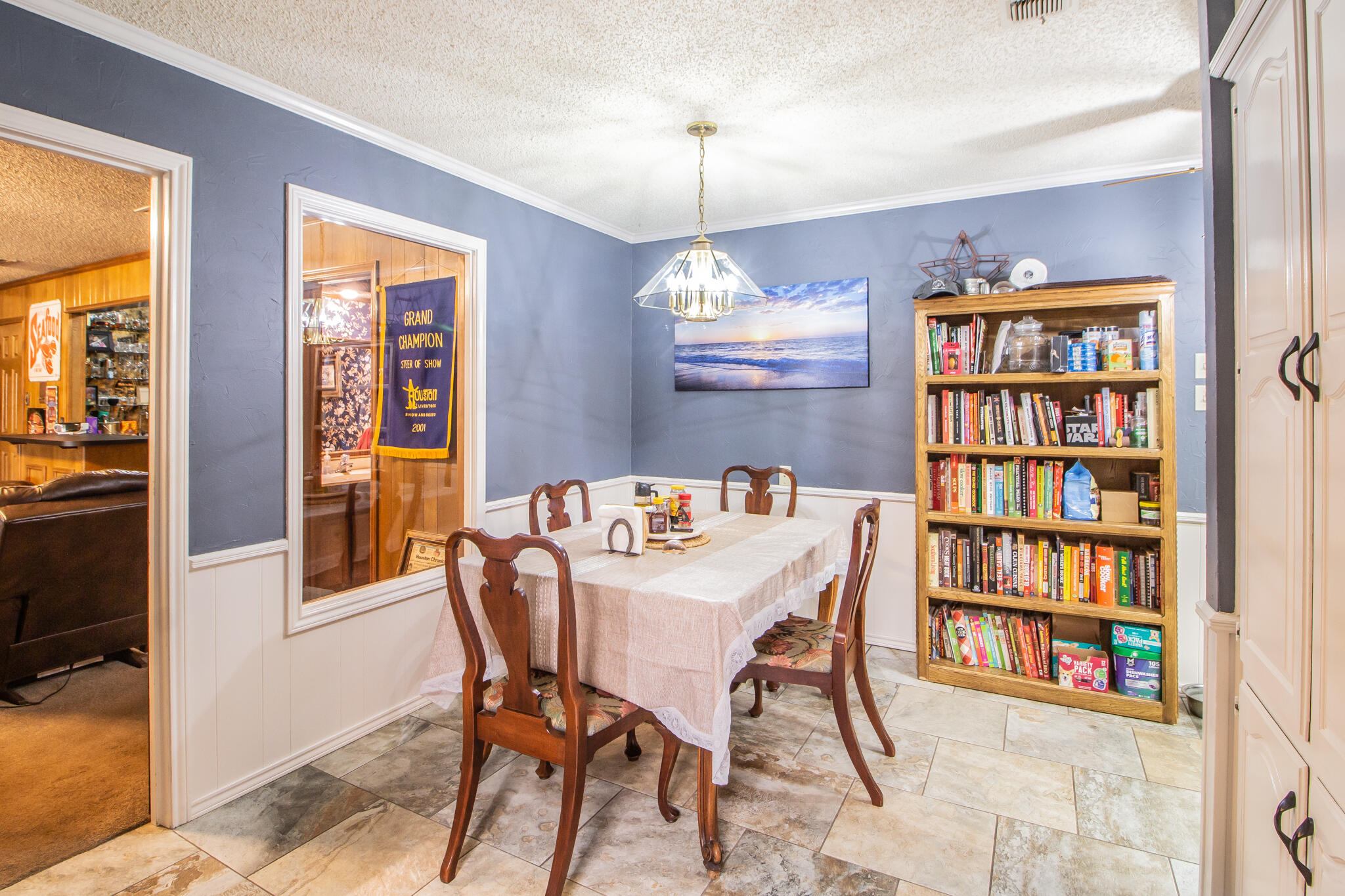 4213 88th Place Lubbock, TX 79423 - Photo 14 of 40 a dining room with furniture and window