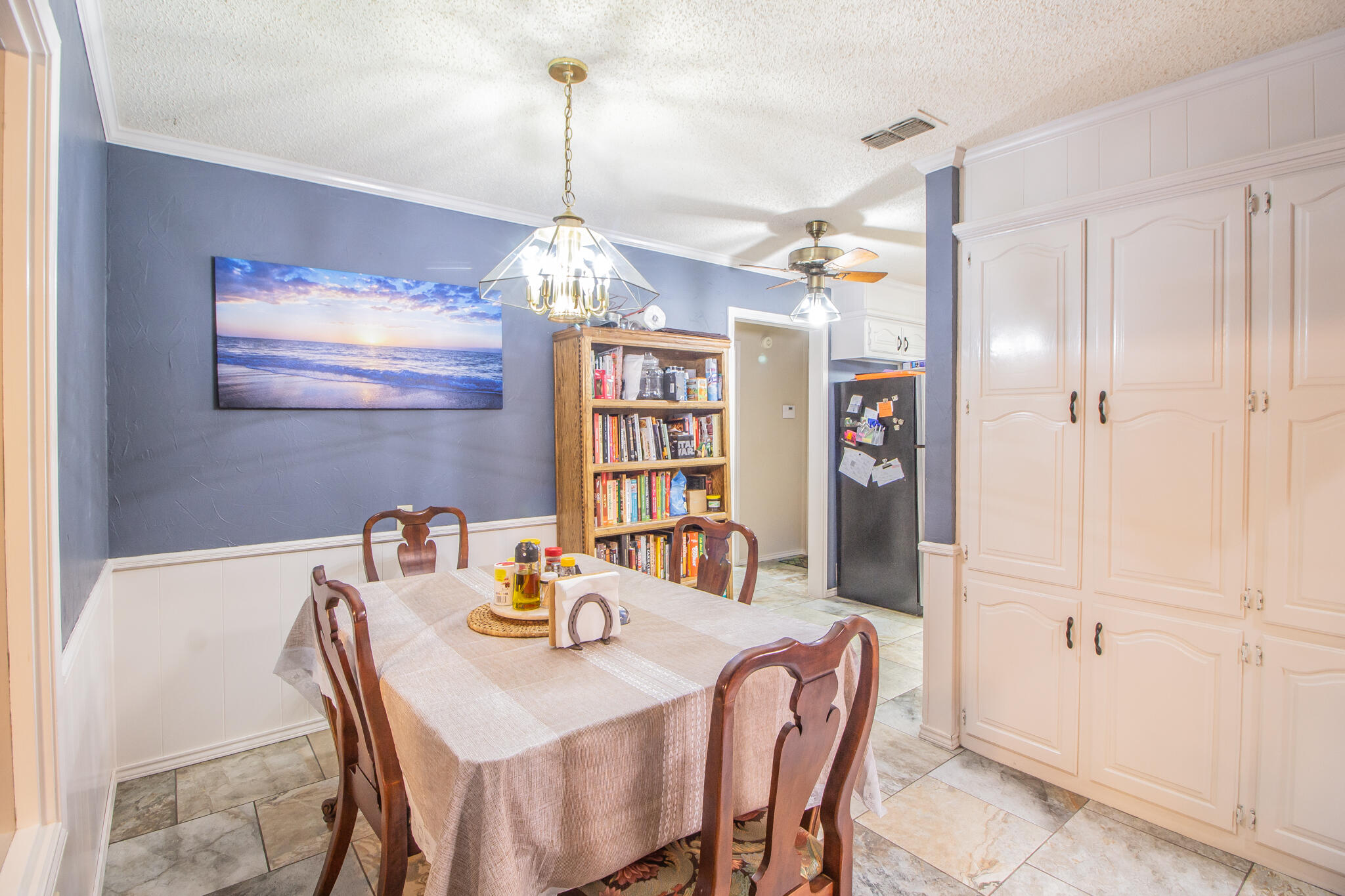 4213 88th Place Lubbock, TX 79423 - Photo 15 of 40 a view of a dining room with furniture