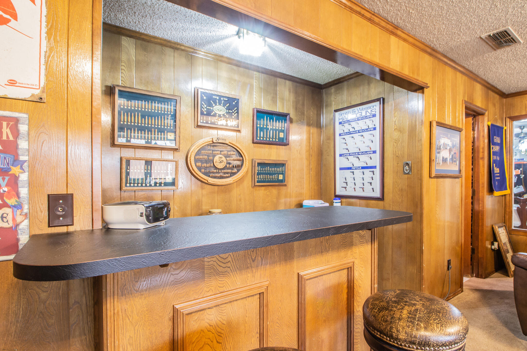 4213 88th Place Lubbock, TX 79423 - Photo 20 of 40 a kitchen with a sink and a stove with wooden floor
