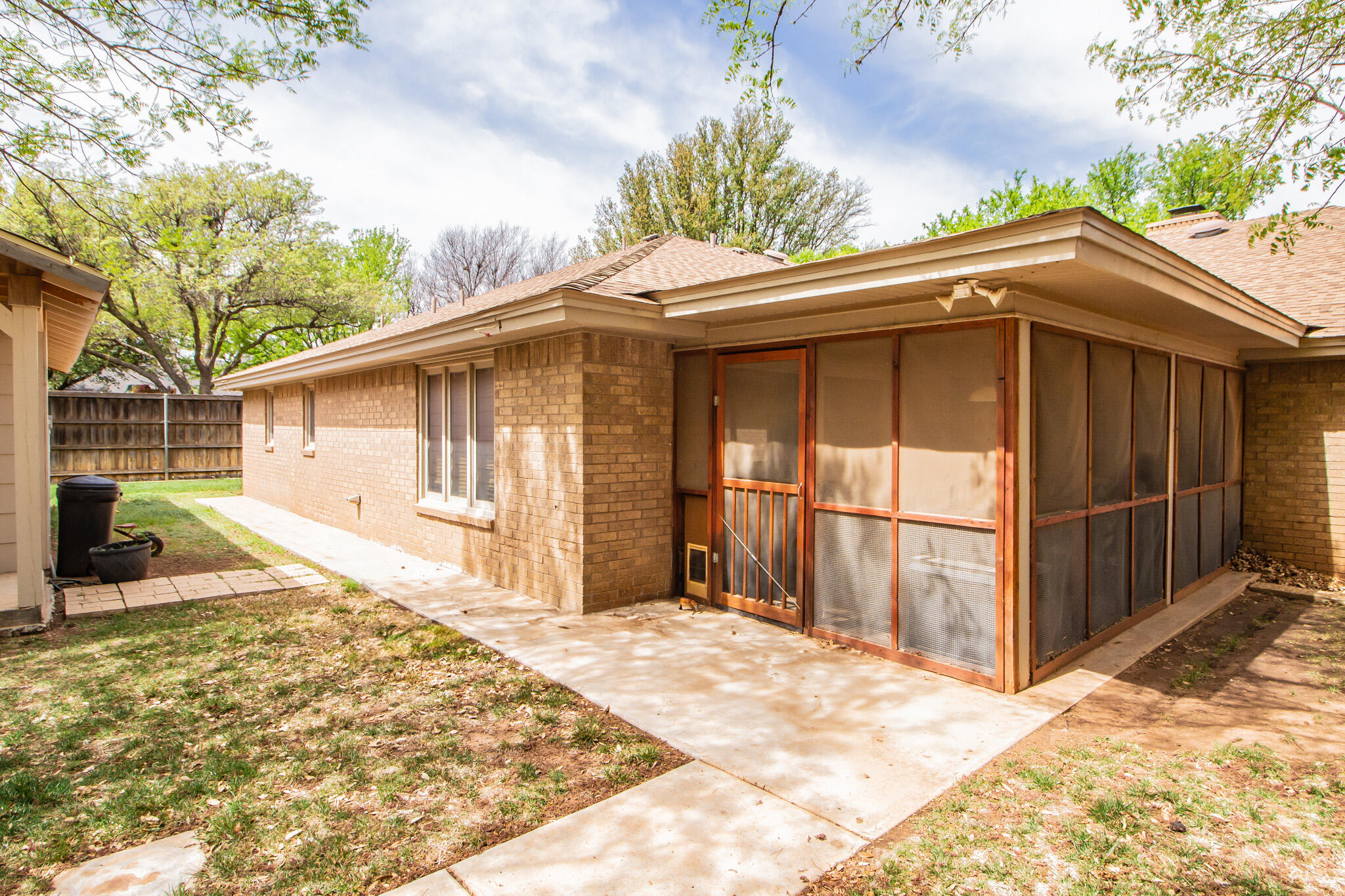 4213 88th Place Lubbock, TX 79423 - Photo 35 of 40 a view of a house with a backyard