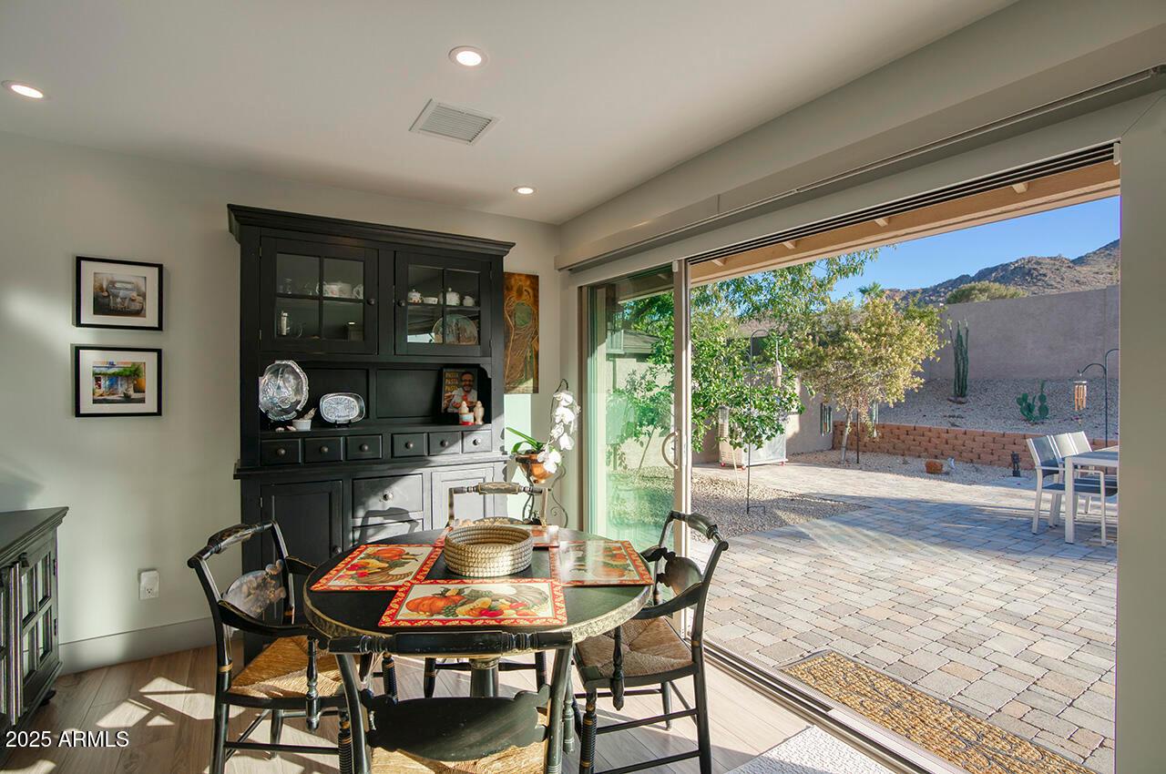3337 East Las Rocas Drive Phoenix, AZ 85028 - Photo 4 of 22 a dining room with furniture and window