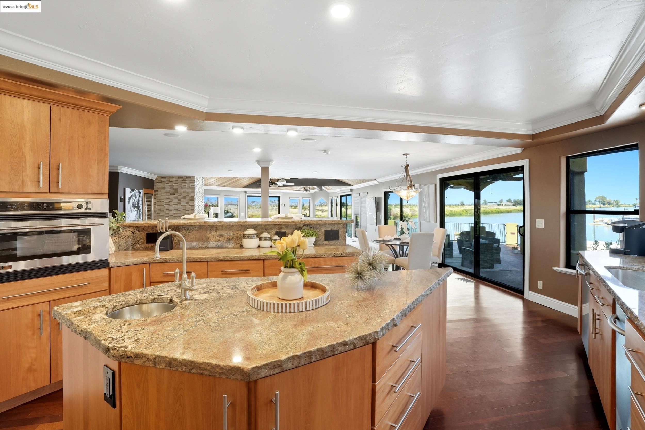 4814 S Point Discovery Bay, CA 94505 - Photo 12 of 52 a kitchen with a sink counter top space and wooden floor