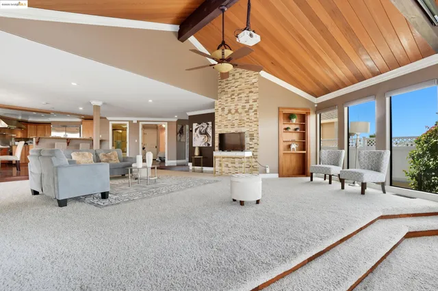 a living room with furniture and a table