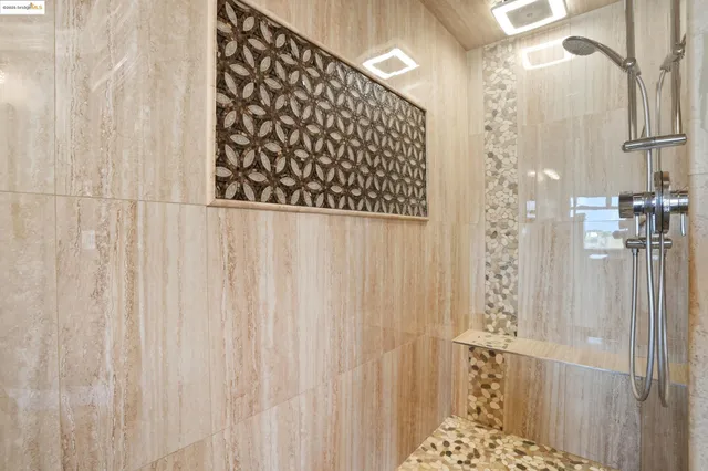 a bathroom with a shower curtain and a curtain