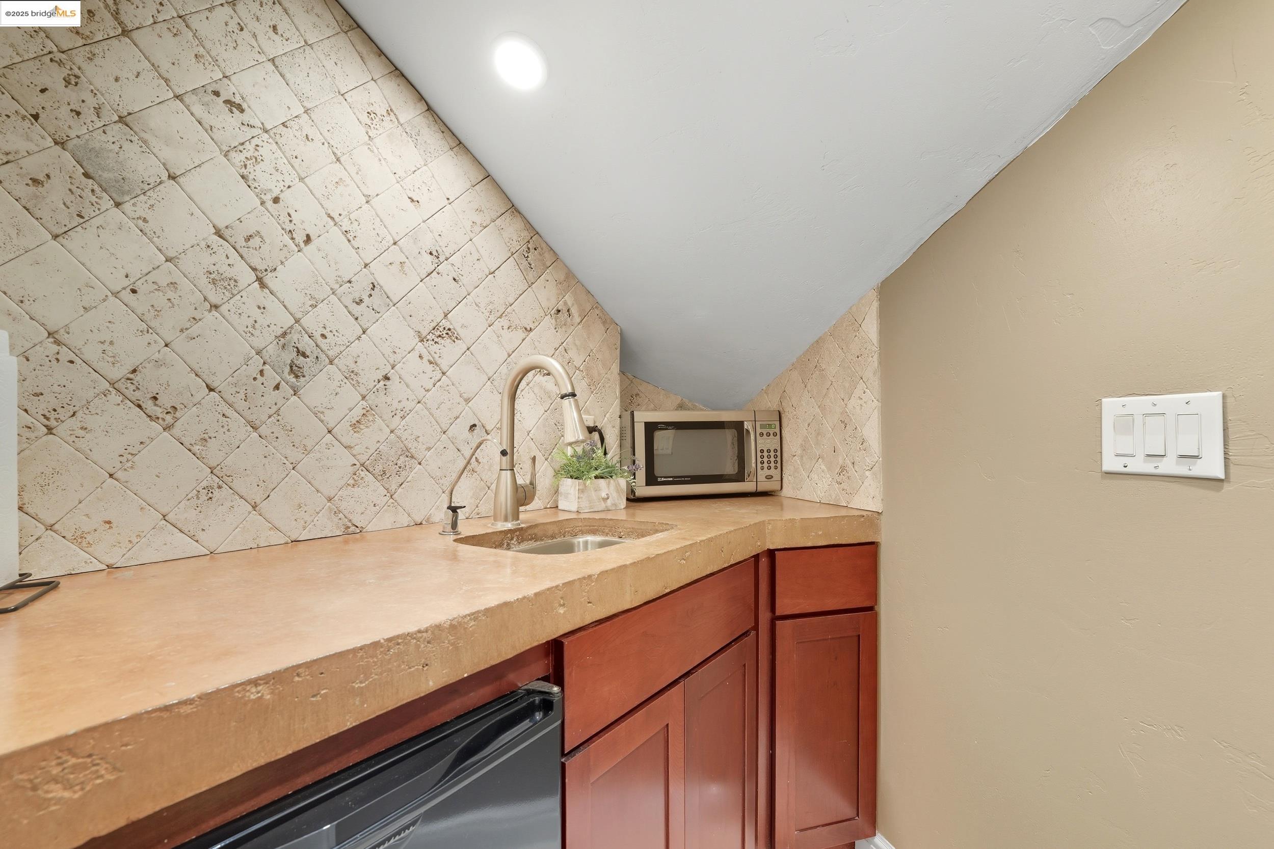 4814 S Point Discovery Bay, CA 94505 - Photo 34 of 52 a bathroom with a granite countertop sink and a mirror