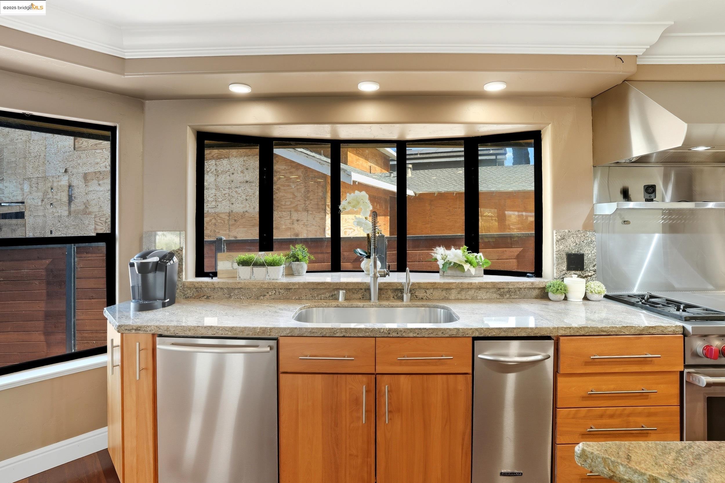 4814 S Point Discovery Bay, CA 94505 - Photo 4 of 52 a kitchen with stainless steel appliances granite countertop a sink and a window