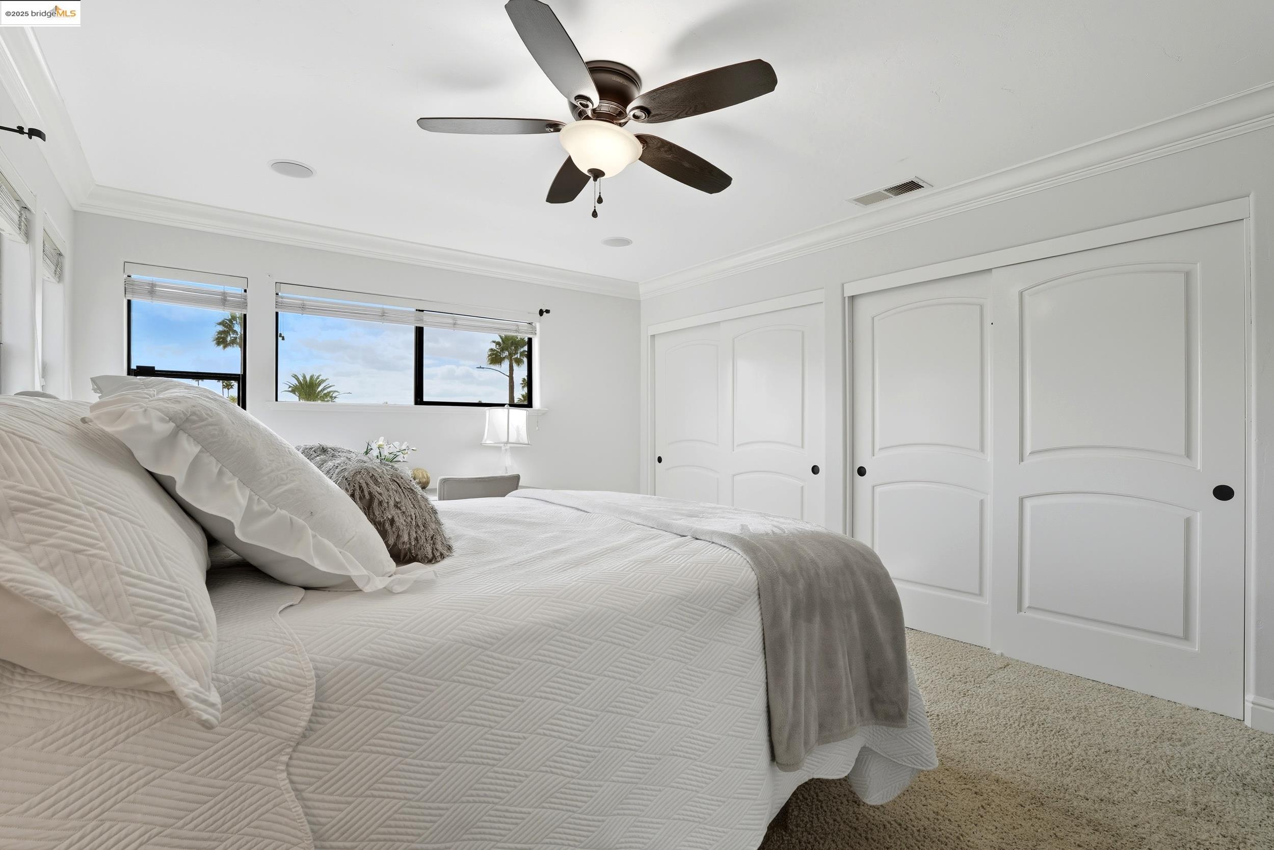 4814 S Point Discovery Bay, CA 94505 - Photo 43 of 52 a spacious bedroom with a bed and a ceiling fan