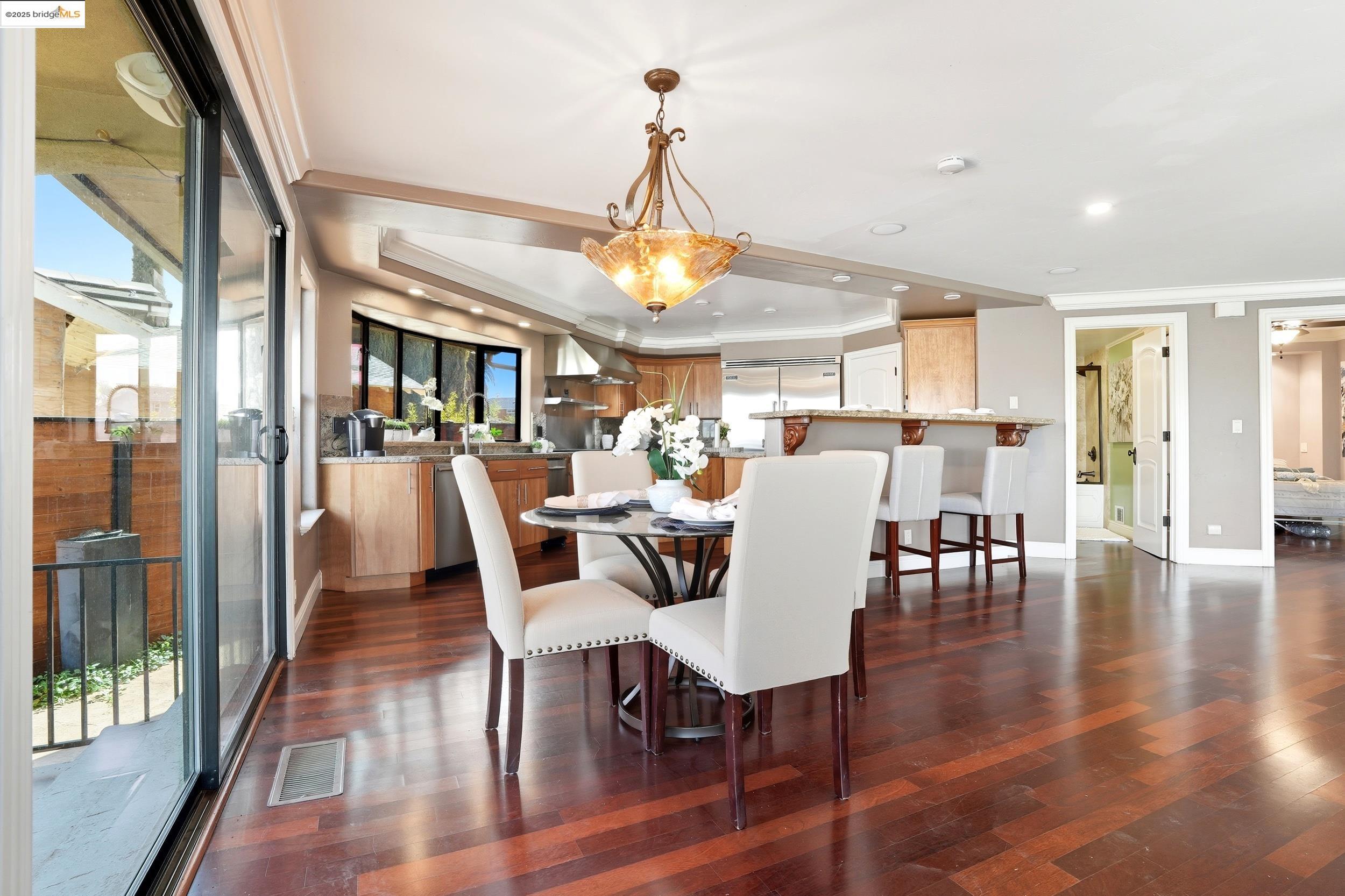 4814 S Point Discovery Bay, CA 94505 - Photo 7 of 52 a view of a dining room with furniture window and wooden floor