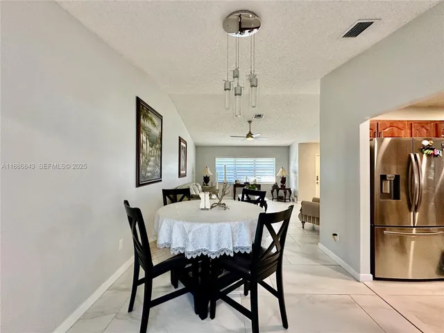a view of a dining room and livingroom