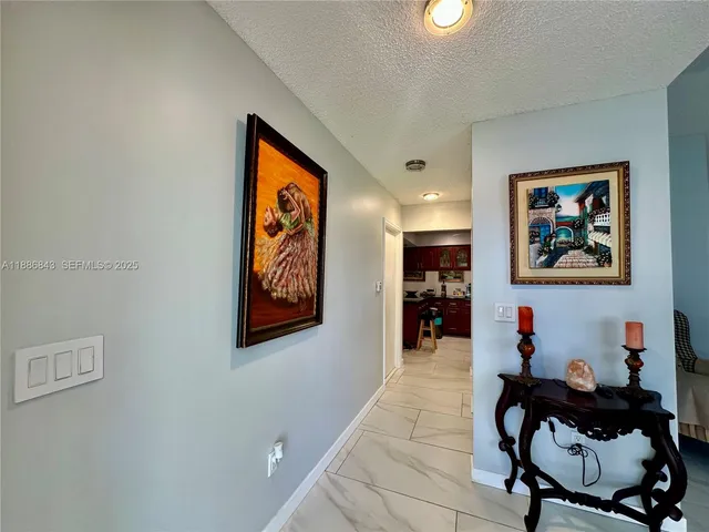 a bedroom with a bed and a mirror