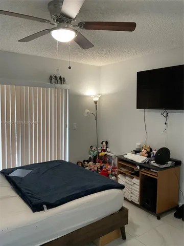 a patio with table and chairs