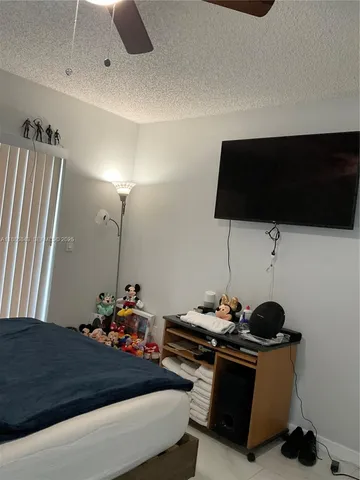 a patio with patio a table and chairs