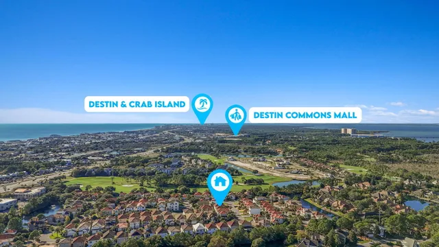 an aerial view of residential building and trees around