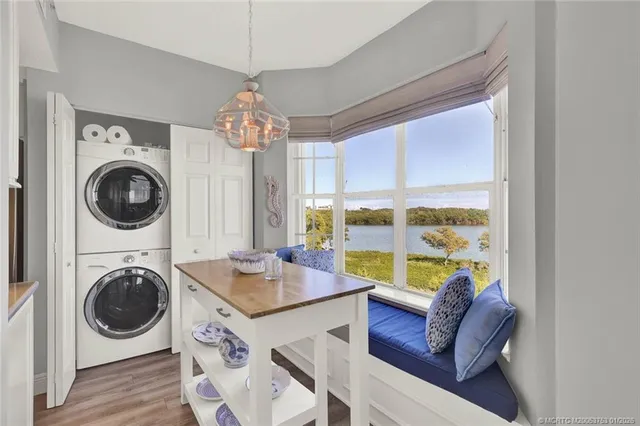 a kitchen with stainless steel appliances a refrigerator sink and cabinets
