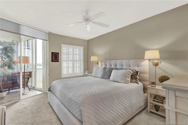 a white toilet sitting next to a bathroom sink and tub