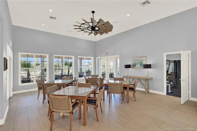an aerial view of a house with yard swimming pool and outdoor seating
