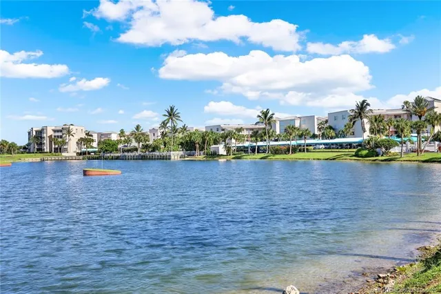 a view of a lake with a city