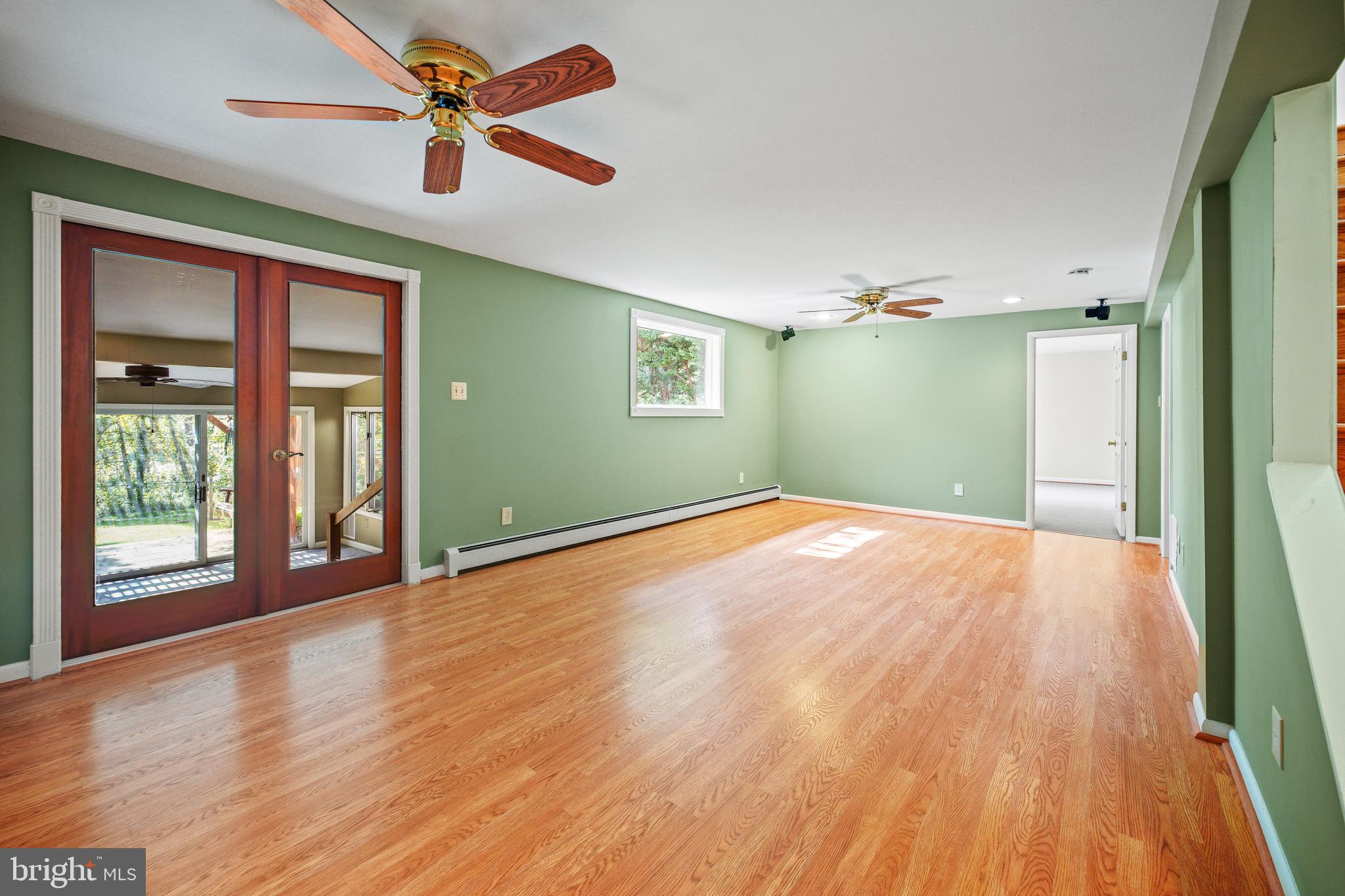212 Beaumont Road Silver Spring, MD 20904 - Photo 40 of 69 Family Room with Walk-Out to Sunroom