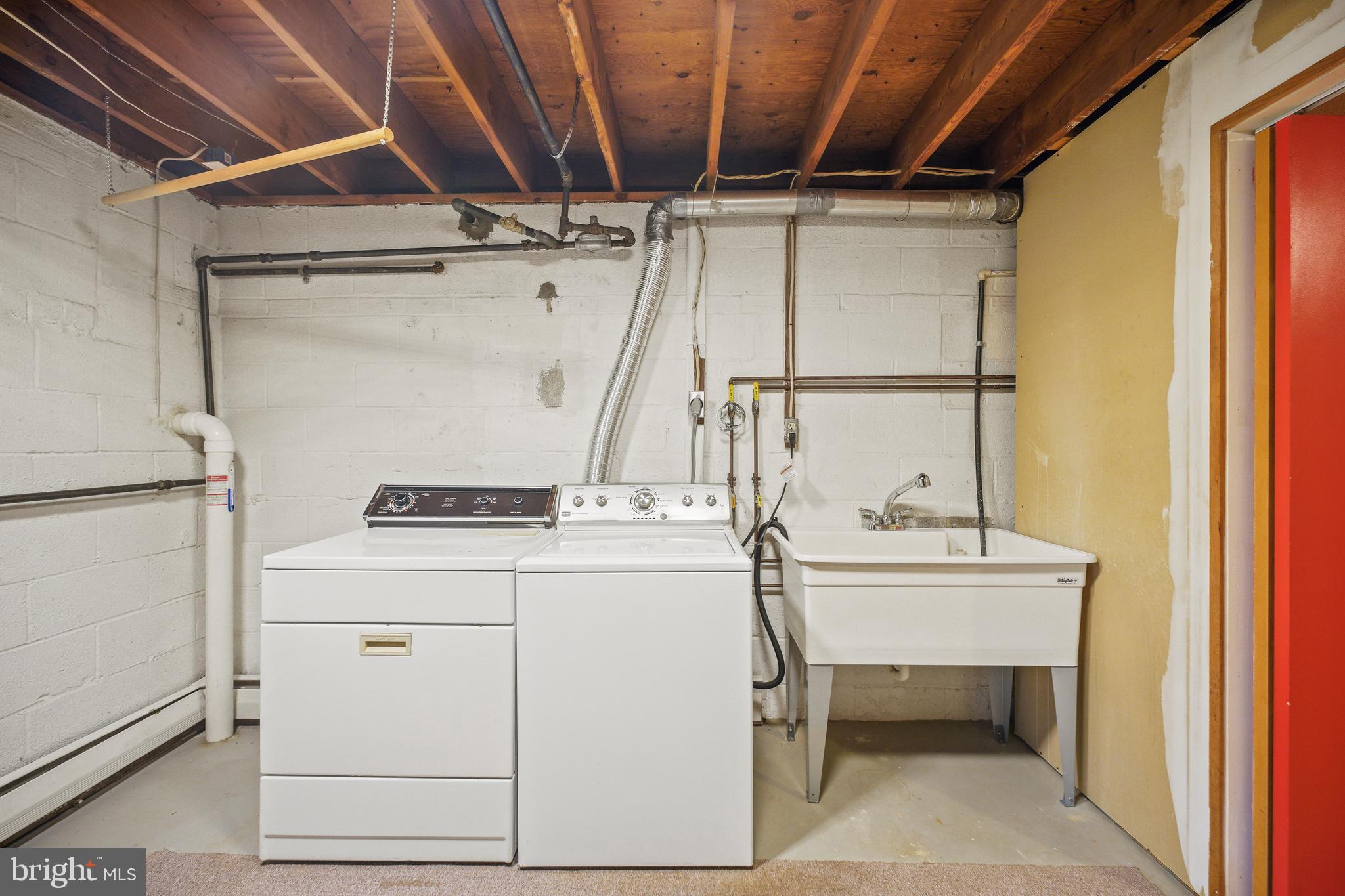 212 Beaumont Road Silver Spring, MD 20904 - Photo 52 of 69 Spacious Laundry Room with Exit