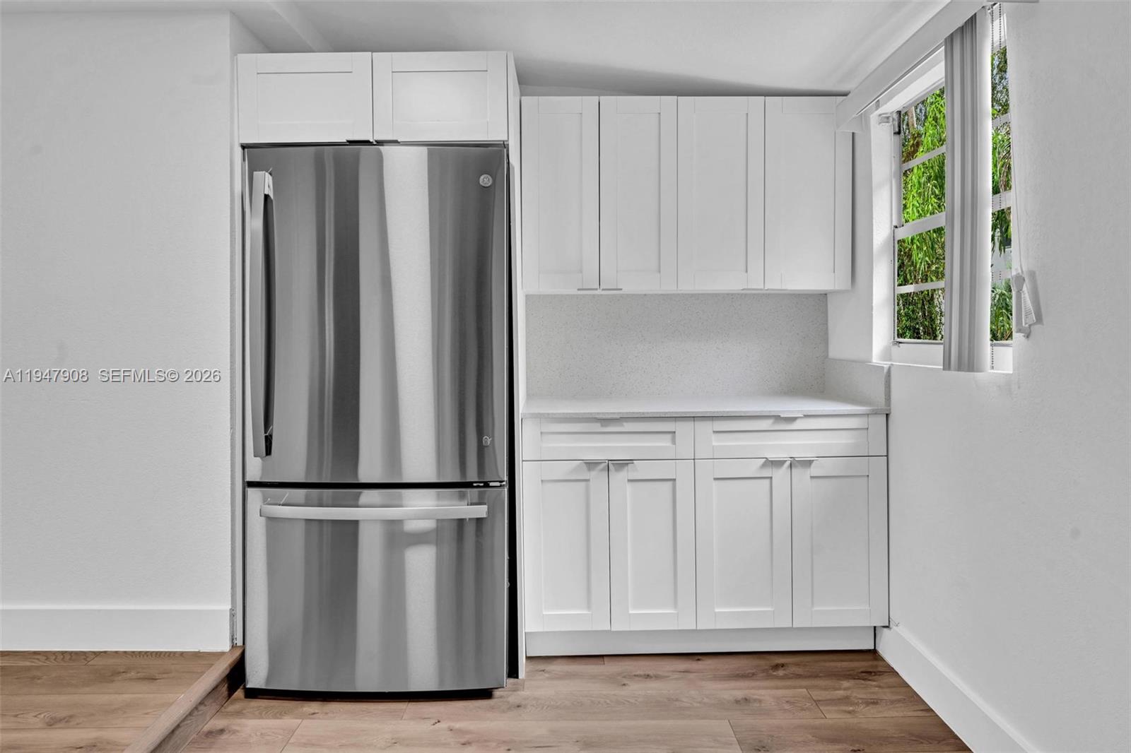 2636 Southwest 29th Court Miami, FL 33133 - Photo 17 of 33 a kitchen with appliances and cabinets