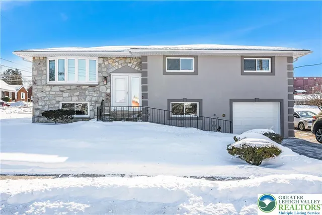 a view of an entryway with a fireplace