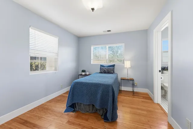 a room that has a bed and a window