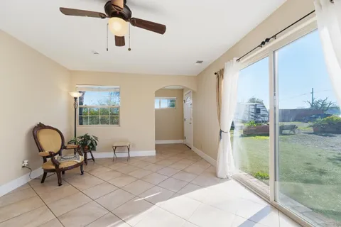 a view of workspace with furniture and windows
