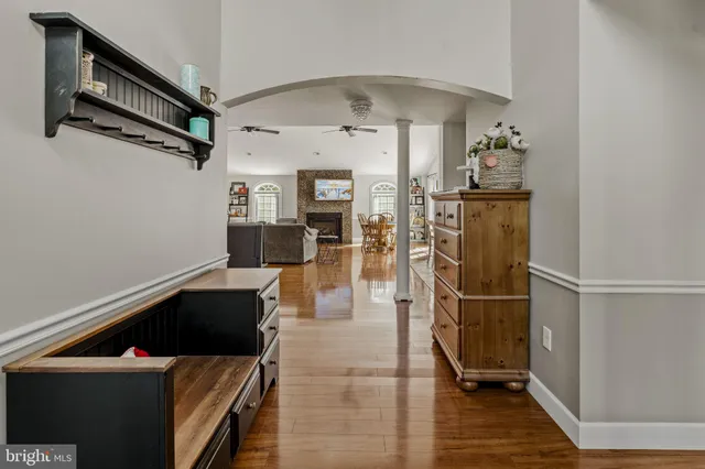 a kitchen with stainless steel appliances granite countertop a refrigerator and a stove