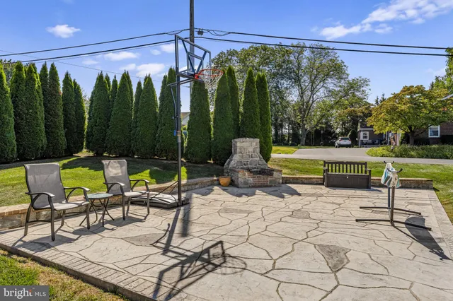 a house that has sitting area in front of it
