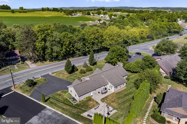 a bedroom with furniture and a fireplace