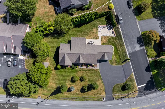 a bedroom with bed and cabinets