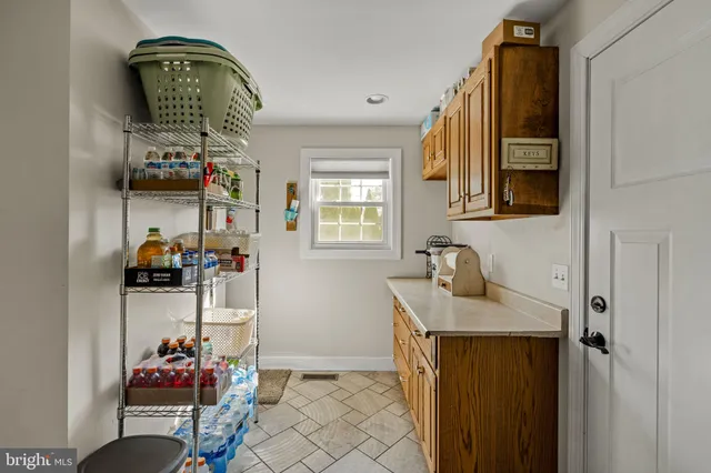 a view of a workspace with furniture