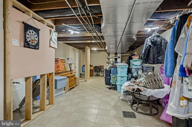 a bathroom with a sink vanity granite and a mirror