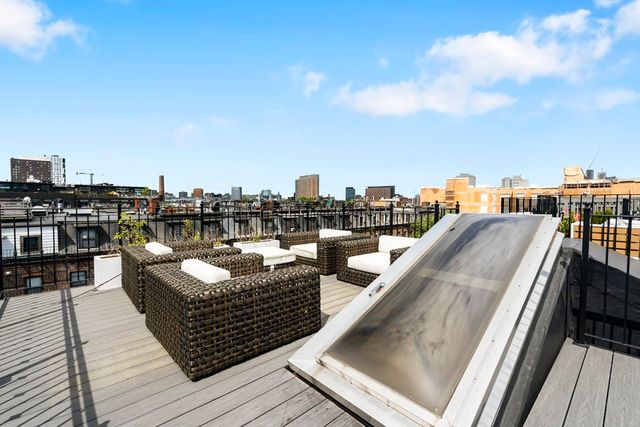 a view of a city with tall buildings